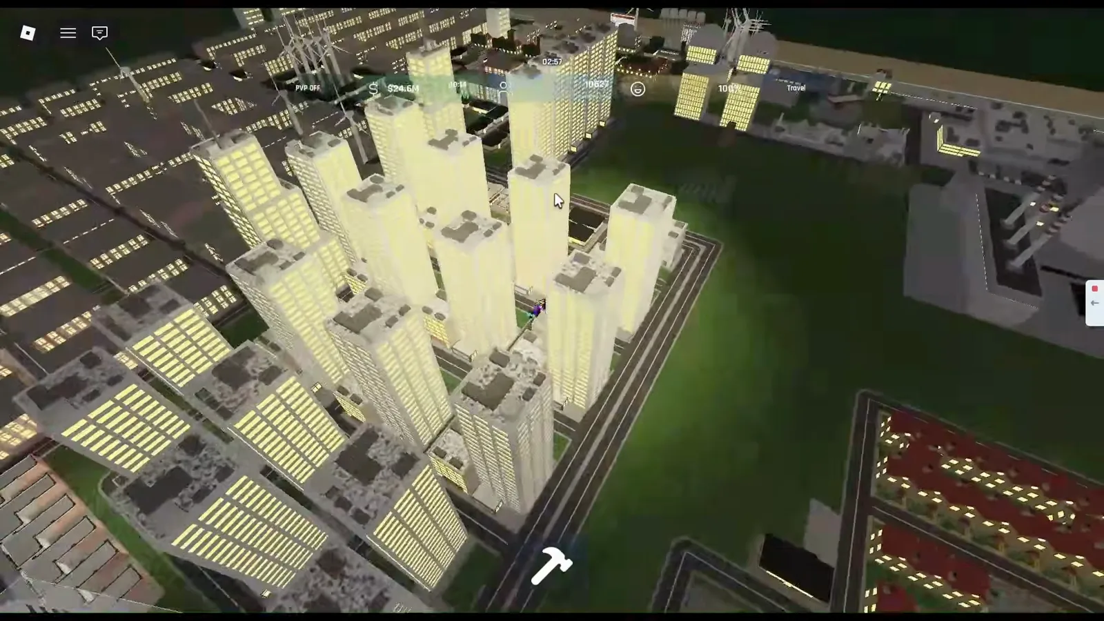 Build and Conquer Roblox top-down night view with a dense central apartment tower cluster, industrial smokestacks and factories on the plot edges, and suburban house blocks along bottom roads.
