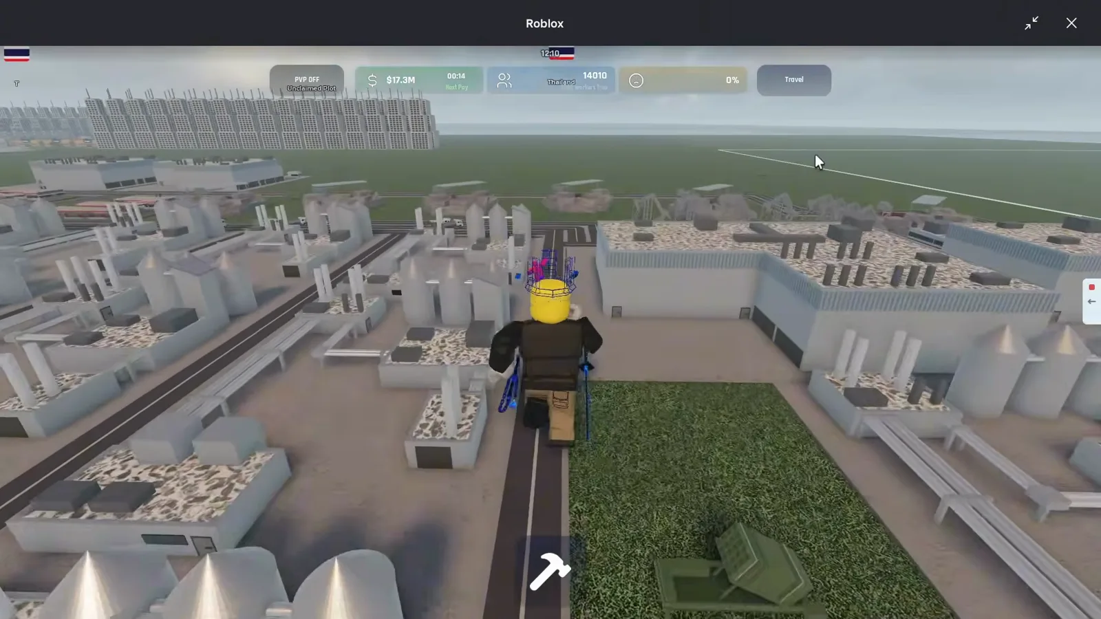 Industrial district aerial with $17.3M cash, 14010 population, and rows of grey factories beside a green missile launcher on grass.